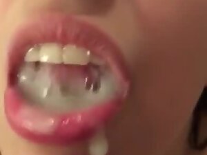 Wife's pretty mouth filled with lots of cum