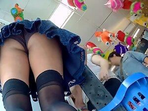Upskirt of a girl in sexy stockings Picture 4