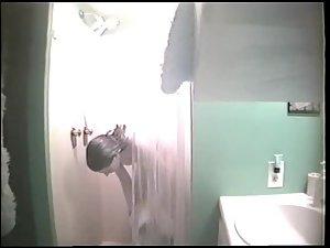 Sporty girl dressing after a hot shower Picture 2