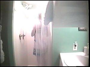 Sporty girl dressing after a hot shower Picture 3