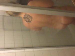 Peeping on tattooed chunky girl in shower Picture 3