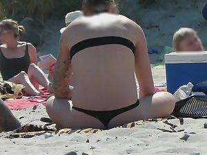 Unique tattoos and hot ass in thong bikini Picture 7