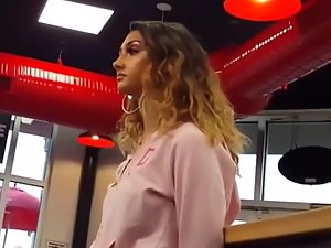 Teen beauty with full makeup in fast food