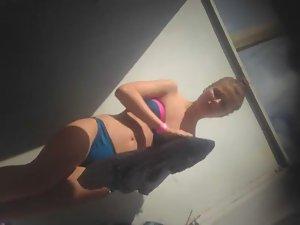 Teen girl dressing after a beach day Picture 2