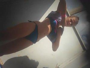 Teen girl dressing after a beach day Picture 3