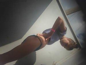 Teen girl dressing after a beach day Picture 4