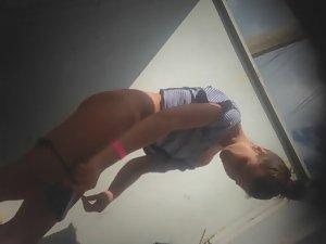 Teen girl dressing after a beach day Picture 5