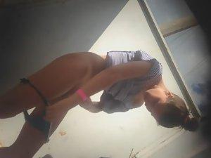 Teen girl dressing after a beach day Picture 6