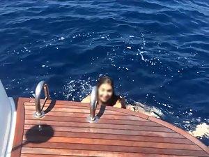 Happy girl enjoys being topless on a yacht Picture 5
