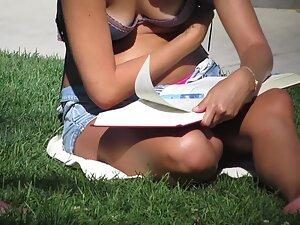 Sweet tits slipping out of a bra in the park Picture 2
