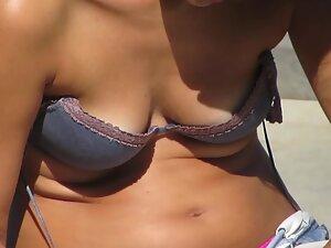 Sweet tits slipping out of a bra in the park Picture 5