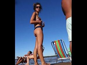 Impressive tight round buttocks on beach Picture 4