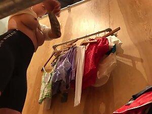 Fuckable tattooed girl caught by voyeur in fitting room Picture 3