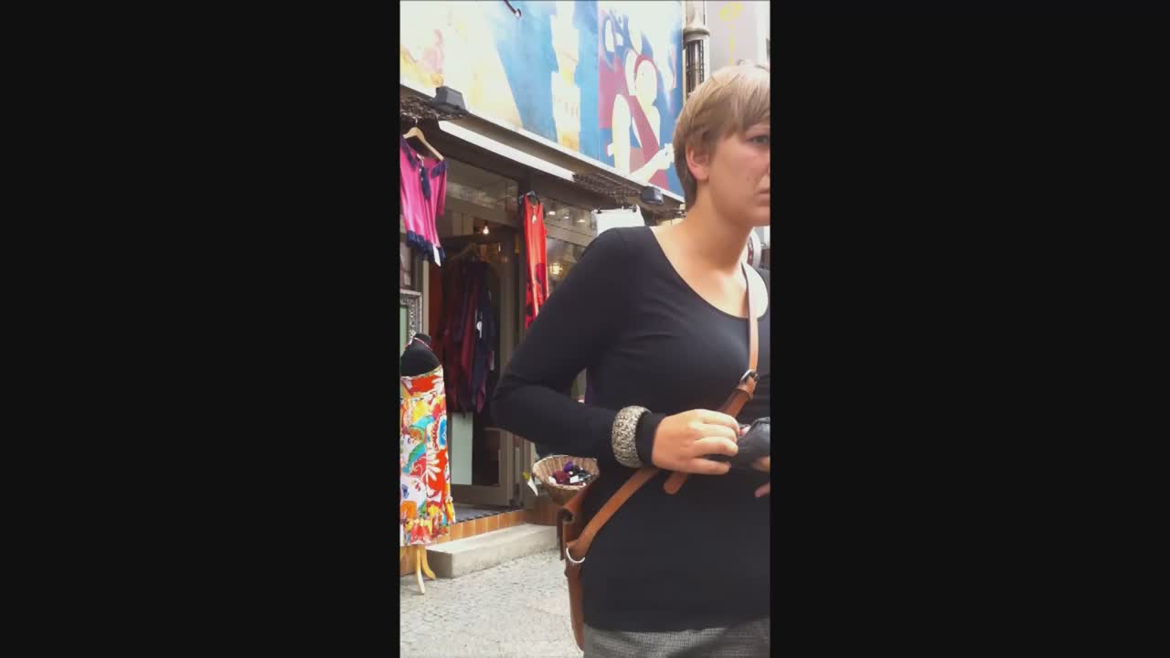 Busty tomboy with purse strap between tits - Voyeur Videos