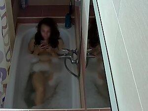 Roommate caught texting and masturbating in bathtub Picture 1