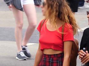 Hard nipples of a braless girl in a red top Picture 6
