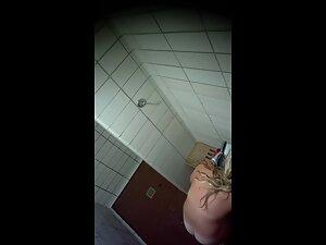 Spying on curvy blonde's tan lines in public shower Picture 4