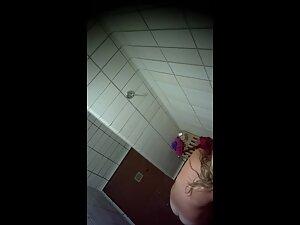 Spying on curvy blonde's tan lines in public shower Picture 5