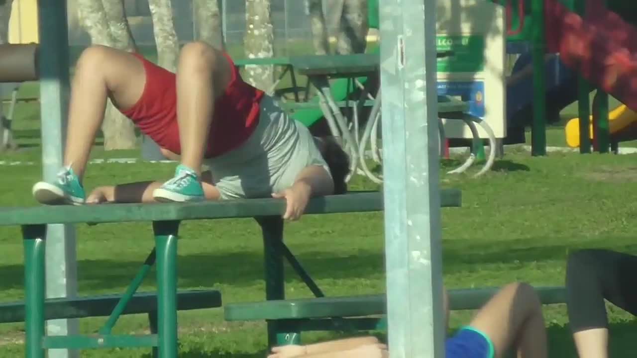 skinny protest Subjective Pussy slip during exercise in park - Voyeur Videos