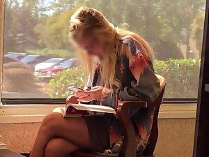 Upskirt shows bookworm blonde isn't wearing panties Picture 5