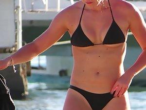 Fit body of hot surfer girl in a bikini Picture 1