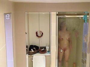 Spying on juicy breasts of naked milf in bathroom Picture 4