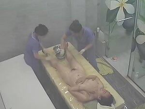 Spying on rich woman getting a four hand massage Picture 3