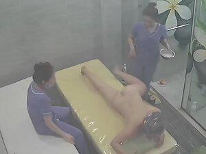 Spying on rich woman getting a four hand massage Picture 5