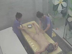 Spying on rich woman getting a four hand massage Picture 6