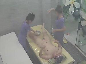 Spying on rich woman getting a four hand massage Picture 7
