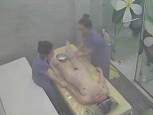 Spying on rich woman getting a four hand massage Picture 8