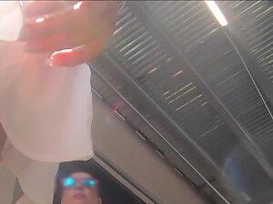 Upkirt of fantastic ass and pussy slipping out of pink string thong Picture 3