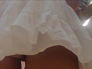 Upkirt of fantastic ass and pussy slipping out of pink string thong Picture 4