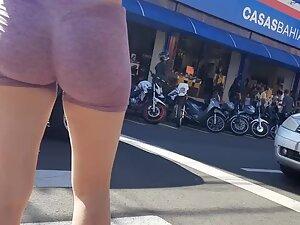 Incredible tight ass in tiny shorts caught at road crosswalk