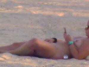 Nudist girl got caught while rubbing pussy on beach Picture 2