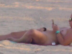 Nudist girl got caught while rubbing pussy on beach Picture 4