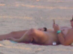 Nudist girl got caught while rubbing pussy on beach Picture 6