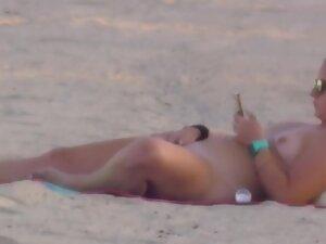 Nudist girl got caught while rubbing pussy on beach Picture 8