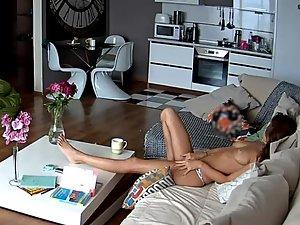 Bored girl masturbates on the sofa Picture 5