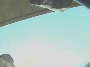 Tattoed butt under a striped skirt Picture 3