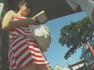 Tattoed butt under a striped skirt Picture 6