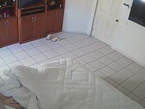 Spying on naked housewife in bed with a vibrator