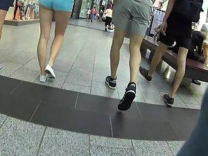 Elegant teen in shorts walks with hipster boyfriend Picture 1