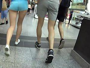 Elegant teen in shorts walks with hipster boyfriend Picture 2