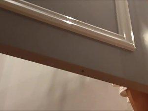 Spying on her tight ass in a trying booth Picture 2