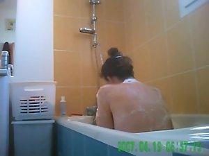 Voyeur spies her hot body in the bath Picture 5