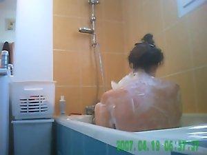 Voyeur spies her hot body in the bath Picture 6