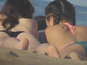 Asian teen girl bends over on beach Picture 6