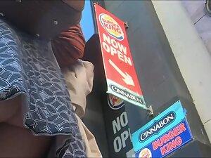 Upskirt of geeky girl shows her butt countless times Picture 2