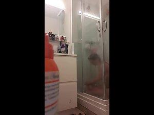 Spying on curvy redhead and her big naked ass Picture 1